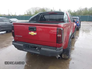 2018 Chevrolet Colorado 4WD ZR2 with VIN 1GCPTEE16J1138755, listed as a IAAI auction lot 41215626 with 118,661 mi miles. Bid and sale history available at carsss.com. Image 4.