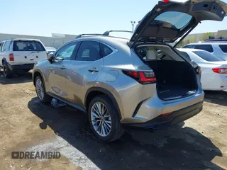 2025 Lexus NX with VIN JTJHKCEZ1S2049993, listed as a IAAI auction lot 41999283 with 2,825 mi miles. Bid and sale history available at carsss.com. Image 3.
