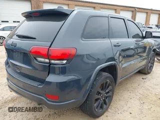 2018 Jeep Grand Cherokee Laredo with VIN 1C4RJFAG4JC303222, listed as a IAAI auction lot 42276244 with 83,585 mi miles and . Bid and sale history available at DreamBid. Image 4.