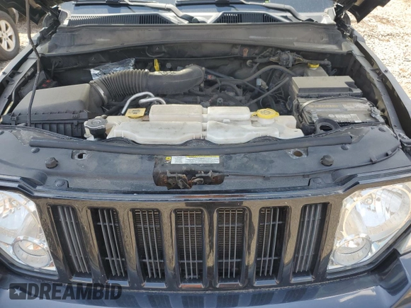 2012 Jeep Liberty Sport with VIN 1C4PJMAK9CW182088, listed as a Copart auction lot 61964575 with 107,911 mi miles and Salvage title. Bid and sale history available at DreamBid. Image 12.