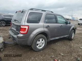 2010 Ford Escape XLT с VIN 1FMCU9D70AKD14536, выставлен на аукционе Copart как лот 54414855 с пробегом Не указан миль и Списание • Salvage title. История ставок и продаж доступна на DreamBid. Изображение 3.