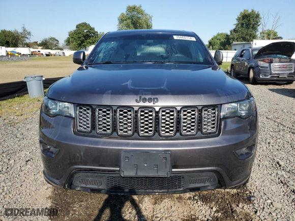 2018 Jeep Grand Cherokee Laredo E with VIN 1C4RJFAG5JC148230, listed as a Copart auction lot 70460154 with 0 mi miles and Salvage Title. Bid and sale history available at carsss.com. Image 5.