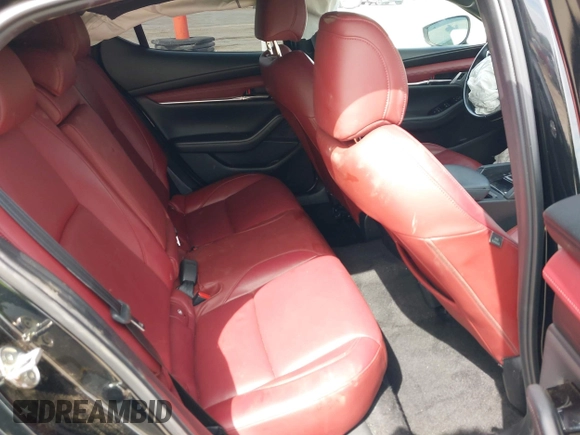 2021 Mazda 3 Premium Plus z VIN JM1BPBNY2M1403797, wystawiony jako IAAI lot #42031637 z przebiegiem Nie podano mil oraz . Historia ofert i sprzedaży dostępna na DreamBid. Obrazek 8.