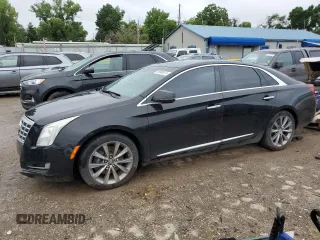 2015 Cadillac XTS Livery z VIN 2G61U5S39F9143284, wystawiony jako Copart lot #59986875 z przebiegiem Nie podano mil oraz Czysty tytuł • Clean title. Historia ofert i sprzedaży dostępna na DreamBid. Obrazek 1.