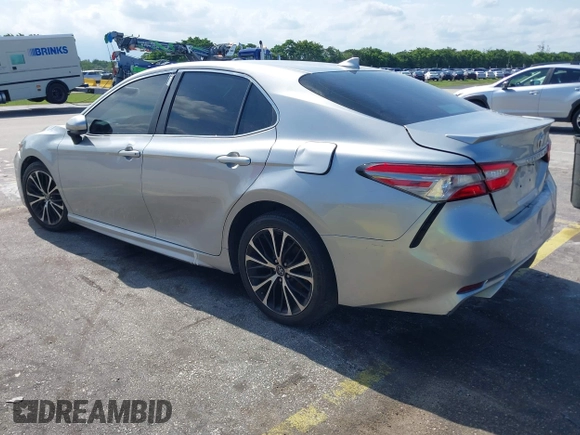 2019 Toyota Camry LE z VIN 4T1B11HK6KU741715, wystawiony jako IAAI lot #42392445 z przebiegiem 138 201 mil mil oraz . Historia ofert i sprzedaży dostępna na DreamBid. Obrazek 3.