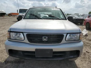 2001 Honda Passport LX z VIN 4S6CK58W414405269, wystawiony jako Copart lot #55362765 z przebiegiem 158 166 mil mil oraz Szkody całkowita. Historia ofert i sprzedaży dostępna na DreamBid. Obrazek 5.