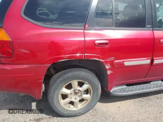 2002 GMC Envoy SLT z VIN 1GKDT13S922268682, wystawiony jako IAAI lot #42348610 z przebiegiem 191 745 mil mil oraz . Historia ofert i sprzedaży dostępna na DreamBid. Obrazek 6.