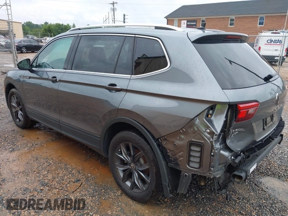 2023 Volkswagen Tiguan SE with VIN 3VVNB7AX4PM042409, listed as a IAAI auction lot 42627800 with 29,016 mi miles and . Bid and sale history available at DreamBid. Image 3.