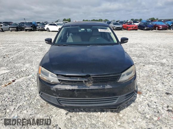 2012 Volkswagen Jetta SE with VIN 3VWDX7AJ3CM114196, listed as a Copart auction lot 61236545 with 128,893 mi miles and Salvage title. Bid and sale history available at DreamBid. Image 5.