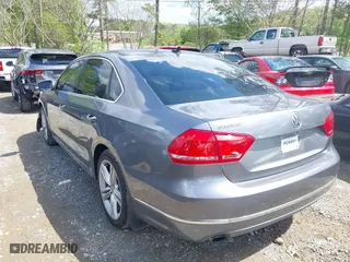 2014 Volkswagen Passat SEL Premium with VIN 1VWCS7A32EC026868, listed as a IAAI auction lot 42020450 with 90,993 mi miles. Bid and sale history available at carsss.com. Image 3.