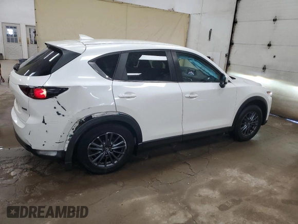 2019 Mazda CX-5 Touring with VIN JM3KFBCM1K0697500, listed as a Copart auction lot 46460735 with 69,412 mi miles and Salvage Title. Bid and sale history available at carsss.com. Image 3.