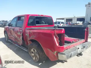 2011 Nissan Titan SV with VIN 1N6BA0ED0BN308385, listed as a IAAI auction lot 41681034 with 184,681 mi miles and . Bid and sale history available at DreamBid. Image 3.