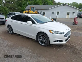 2014 Ford Fusion Titanium с VIN 3FA6P0K97ER352345, выставлен на аукционе IAAI как лот 42370970 с пробегом 182 895 миль миль и . История ставок и продаж доступна на DreamBid. Изображение 1.