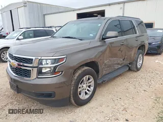 2015 Chevrolet Tahoe LT z VIN 1GNSCBKC2FR685780, wystawiony jako IAAI lot #42354130 z przebiegiem 101 617 mil mil oraz . Historia ofert i sprzedaży dostępna na DreamBid. Obrazek 18.