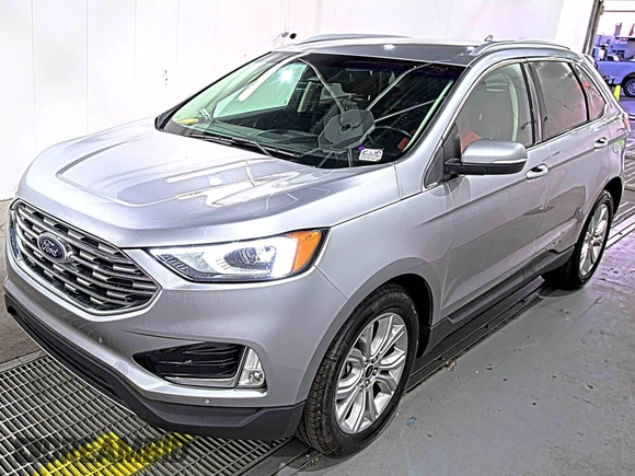2020 Ford Edge Titanium with VIN 2FMPK3K95LBA30678, listed as a IAAI auction lot 42714178 with 60,935 mi miles and . Bid and sale history available at DreamBid. Image 21.