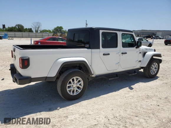 2023 Jeep Gladiator Freedom with VIN 1C6HJTAG1PL585720, listed as a Copart auction lot 47386855 with 14,525 mi miles and Salvage title. Bid and sale history available at DreamBid. Image 3.