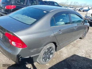 2006 Honda Civic Sdn LX with VIN 1HGFA16516L060197, listed as a IAAI auction lot 41855242 with 204,499 mi miles. Bid and sale history available at carsss.com. Image 4.