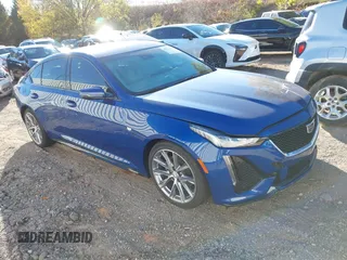 2024 Cadillac CT5 Sport z VIN 1G6DP5RK1R0106519, wystawiony jako IAAI lot #40871393 z przebiegiem Nie podano mil oraz . Historia ofert i sprzedaży dostępna na DreamBid. Obrazek 1.