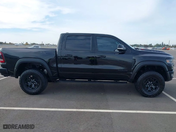 2021 Ram 1500 TRX with VIN 1C6SRFU98MN703355, listed as a IAAI auction lot 40913103 with 27,200 mi miles. Bid and sale history available at carsss.com. Image 13.
