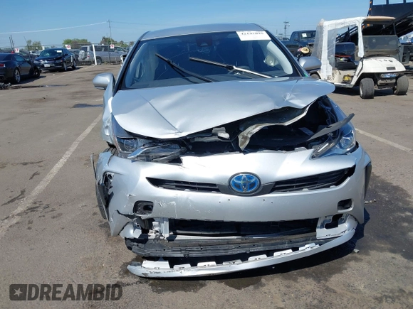 2021 Toyota Prius L Eco with VIN JTDKAMFUXM3144991, listed as a IAAI auction lot 42147025 with 106,466 mi miles and . Bid and sale history available at DreamBid. Image 6.