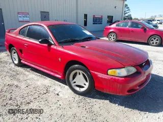 1996 Ford Mustang with VIN 1FALP4044TF203127, listed as a IAAI auction lot 41887713 with 86,008 mi miles. Bid and sale history available at carsss.com. Image 1.