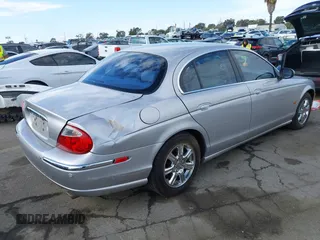 2003 Jaguar S-Type with VIN SAJEA01T83FM48713, listed as a IAAI auction lot 41402152 with 142,875 mi miles and . Bid and sale history available at DreamBid. Image 4.