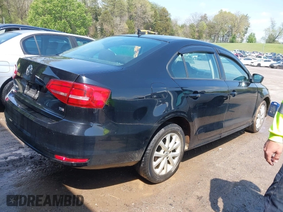 2015 Volkswagen Jetta Sedan 1.8T SE with VIN 3VWD17AJ6FM285921, listed as a IAAI auction lot 42005164 with 173,028 mi miles. Bid and sale history available at carsss.com. Image 4.