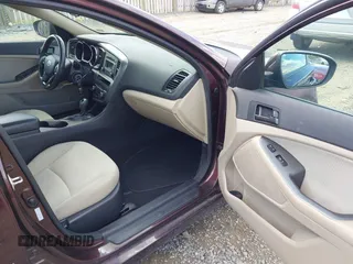 2012 Kia Optima LX with VIN 5XXGM4A77CG033361, listed as a IAAI auction lot 42210159 with 214,137 mi miles and . Bid and sale history available at carsss.com. Image 5.