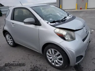 2012 Scion iQ with VIN JTNJJXB03CJ018641, listed as a Copart auction lot 82653104 with 118,617 mi miles and Salvage Title. Bid and sale history available at carsss.com. Image 4.