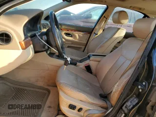 1999 BMW 5 Series 528iA with VIN WBADM634XXGU02243, listed as a Copart auction lot 74981184 with 234,566 mi miles and Salvage Title. Bid and sale history available at carsss.com. Image 7.