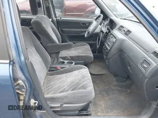 1999 Honda CR-V LX z VIN JHLRD1843XC010302, wystawiony jako IAAI lot #42523518 z przebiegiem 260 047 mil mil oraz . Historia ofert i sprzedaży dostępna na DreamBid. Obrazek 5.