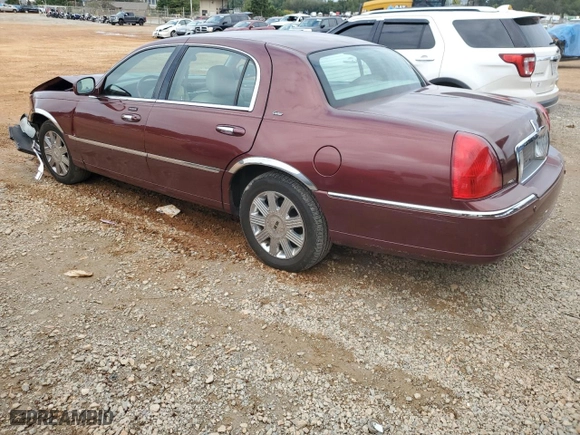 2003 Lincoln Town Car Cartier with VIN 1LNHM83W73Y638138, listed as a Copart auction lot 73698774 with 205,583 mi miles and Salvage Title. Bid and sale history available at carsss.com. Image 2.