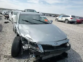 2014 Kia Optima Hybrid EX with VIN KNAGN4ADXE5069276, listed as a Copart auction lot 69298214 with 0 mi miles and Salvage Title. Bid and sale history available at carsss.com. Image 10.