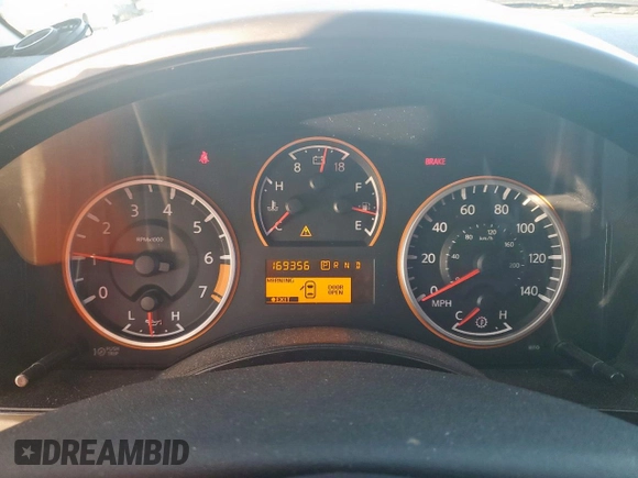 2011 Nissan Titan SV with VIN 1N6BA0ED8BN310143, listed as a Copart auction lot 46824825 with 169,356 mi miles and Salvage Title. Bid and sale history available at DreamBid. Image 9.