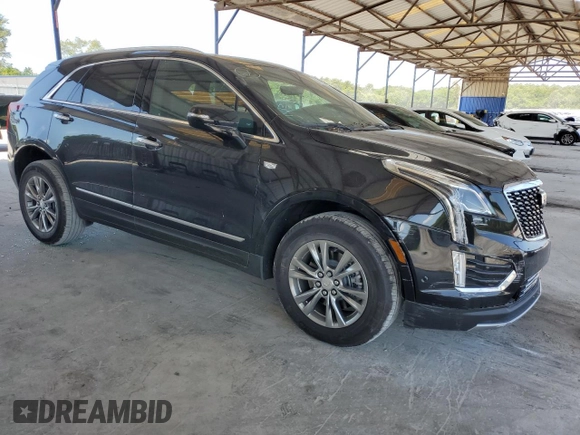 2021 Cadillac XT5 FWD Premium Luxury с VIN 1GYKNCRSXMZ155473, выставлен на аукционе Copart как лот 59883874 с пробегом 2 038 миль миль и Списание • Salvage title. История ставок и продаж доступна на DreamBid. Изображение 4.