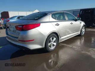 2015 Kia Optima LX with VIN 5XXGM4A71FG484306, listed as a IAAI auction lot 41797482 with 116,181 mi miles and . Bid and sale history available at carsss.com. Image 4.