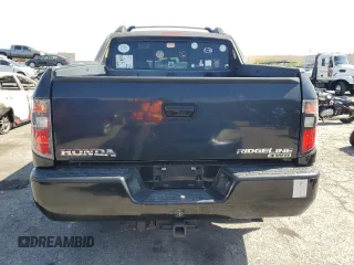 2006 Honda Ridgeline RTL z VIN 2HJYK16586H545773, wystawiony jako Copart lot #58658325 z przebiegiem 166 355 mil mil oraz Czysty tytuł • Clean title. Historia ofert i sprzedaży dostępna na DreamBid. Obrazek 6.
