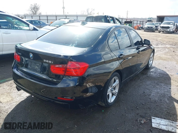 2015 BMW 3 Series 328i xDrive with VIN WBA3B5G56FNS20581, listed as a IAAI auction lot 41692014 with 196,609 mi miles. Bid and sale history available at carsss.com. Image 4.