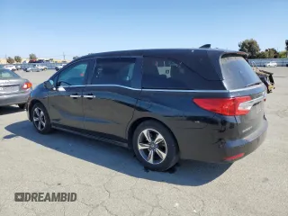 2018 Honda Odyssey Touring with VIN 5FNRL6H80JB065039, listed as a Copart auction lot 54944595 with 81,987 mi miles and Salvage Title. Bid and sale history available at carsss.com. Image 2.