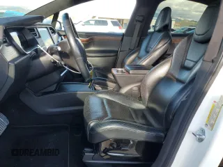 2016 Tesla Model X P90D with VIN 5YJXCBE48GF000255, listed as a Copart auction lot 49186565 with 0 mi miles and Salvage Title. Bid and sale history available at carsss.com. Image 7.