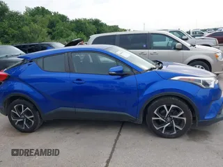 2018 Toyota C-HR XLE z VIN NMTKHMBX3JR043005, wystawiony jako IAAI lot #42419692 z przebiegiem 105 532 mil mil oraz . Historia ofert i sprzedaży dostępna na DreamBid. Obrazek 13.