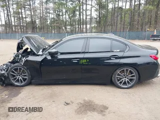 2019 BMW 3 Series 330i xDrive with VIN WBA5R7C52KAJ87697, listed as a IAAI auction lot 41795207 with 53,760 mi miles. Bid and sale history available at carsss.com. Image 14.