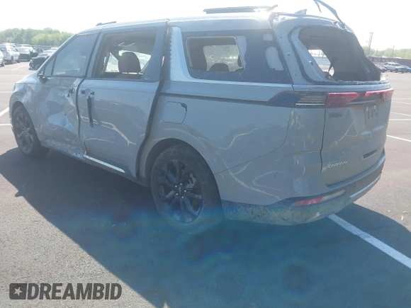 2024 Kia Carnival SX Prestige with VIN KNDNE5H32R6340005, listed as a IAAI auction lot 41984379 with 37,525 mi miles and . Bid and sale history available at DreamBid. Image 3.