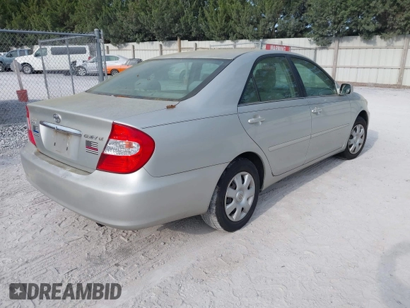 2004 Toyota Camry LE with VIN 4T1BE32K04U286257, listed as a IAAI auction lot 42079619 with 205,634 mi miles. Bid and sale history available at carsss.com. Image 4.