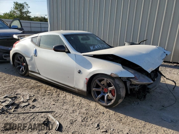 2014 Nissan 370Z Touring with VIN JN1AZ4EH5EM630793, listed as a Copart auction lot 77950484 with 110,229 mi miles and Salvage Title. Bid and sale history available at carsss.com. Image 4.