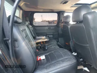 2005 Hummer H2 SUT with VIN 5GRGN22U15H101289, listed as a Copart auction lot 84107974 with 0 mi miles and Salvage Title. Bid and sale history available at carsss.com. Image 10.
