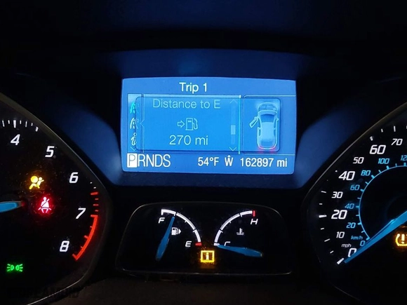 2012 Ford Focus SEL with VIN 1FAHP3H26CL344480, listed as a IAAI auction lot 41882368 with 162,897 mi miles. Bid and sale history available at carsss.com. Image 7.