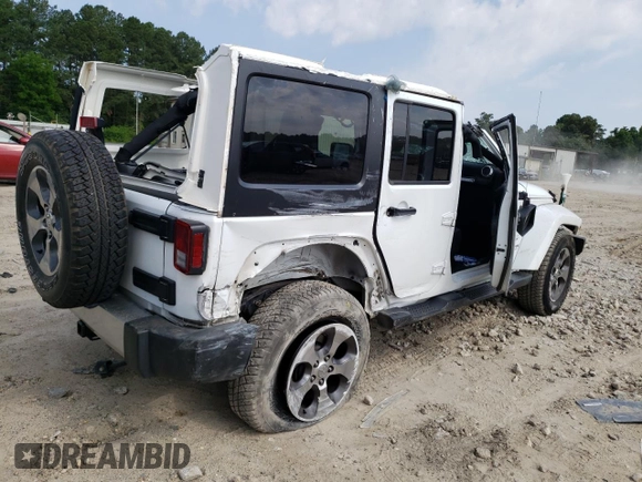 2018 Jeep Wrangler JK Unlimited Sahara with VIN 1C4BJWEG7JL856975, listed as a Copart auction lot 59562484 with 101,419 mi miles and Salvage Title. Bid and sale history available at carsss.com. Image 3.