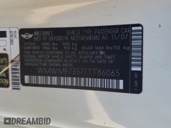 2007 MINI Hardtop S with VIN WMWMF73577TT86065, listed as a Copart auction lot 57262795 with 100,052 mi miles and Salvage Title. Bid and sale history available at DreamBid. Image 13.