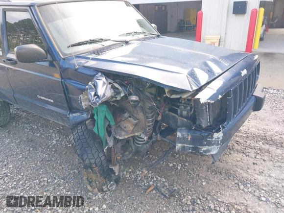 2001 Jeep Cherokee Sport with VIN 1J4FT48S71L525856, listed as a IAAI auction lot 42349383 with 218,122 mi miles and . Bid and sale history available at DreamBid. Image 6.